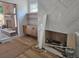 Bright room with herringbone tiled fireplace, modern cabinets, and outdoor patio access at 490 Waterman St, Marietta, GA 30060