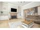 Cozy living room features hardwood floors, neutral walls, and a fireplace for a warm and inviting atmosphere at 255 Old Town Rd, Dacula, GA 30019