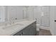 Bathroom with double vanity, quartz countertop and shower at 1788 Peach Blossom Ne Ln # 45, Atlanta, GA 30324