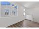 Bedroom with hardwood floors and large windows at 1788 Peach Blossom Ne Ln # 45, Atlanta, GA 30324