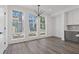 Spacious dining area with hardwood floors and large windows at 1788 Peach Blossom Ne Ln # 45, Atlanta, GA 30324