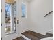 Front entry features glass door and hardwood floors at 1788 Peach Blossom Ne Ln # 45, Atlanta, GA 30324