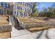 Stone stairway leads to charming townhome with front balcony at 1788 Peach Blossom Ne Ln # 45, Atlanta, GA 30324