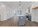 Open concept kitchen with gray island and stainless steel appliances at 1788 Peach Blossom Ne Ln # 45, Atlanta, GA 30324