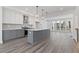 Modern kitchen boasts gray cabinets, quartz island, and stainless steel appliances at 1788 Peach Blossom Ne Ln # 45, Atlanta, GA 30324