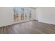 Bright living room with hardwood floors and access to a private balcony at 1788 Peach Blossom Ne Ln # 45, Atlanta, GA 30324
