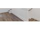 Modern staircase with hardwood floors and white walls at 1788 Peach Blossom Ne Ln # 45, Atlanta, GA 30324