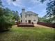 Large backyard with wood deck, privacy fence, and plenty of green space at 200 Eagle Glen Ct, Woodstock, GA 30189