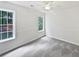 This bedroom has neutral carpeting, fresh paint and lots of natural light at 200 Eagle Glen Ct, Woodstock, GA 30189