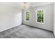 Well-lit bedroom with a large window and neutral carpet at 200 Eagle Glen Ct, Woodstock, GA 30189