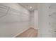 Spacious walk-in closet with shelving for optimal organization and storage at 212 Sanctuary Drive, Mcdonough, GA 30253
