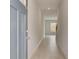 Entryway featuring gray walls, light wood floors, and an open transition to the living area at 212 Sanctuary Drive, Mcdonough, GA 30253