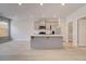 Open concept eat-in kitchen with stainless steel appliances and bright, natural light at 212 Sanctuary Drive, Mcdonough, GA 30253