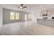 Living room featuring light gray walls, wood floors, and bright natural light at 212 Sanctuary Drive, Mcdonough, GA 30253
