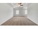 Large main bedroom featuring a trey ceiling, ceiling fan, carpeted floor, and natural light at 212 Sanctuary Drive, Mcdonough, GA 30253