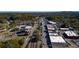 Aerial view of the neighborhood with tree lined streets, sidewalks, and a walkable downtown area at 4569 Grenadine Cir, Acworth, GA 30101