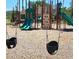 Community playground features colorful climbing structures, slides, and swings, providing a fun and safe recreational area at 130 Oakchase Park Ln, Hampton, GA 30228