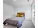 Comfortable bedroom featuring soft gray carpet and a window, creating a serene retreat for relaxation at 93 Sheryl Way, Loganville, GA 30052
