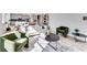 Bright and airy living room with modern decor and large windows at 93 Sheryl Way, Loganville, GA 30052