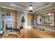This professional gym features exercise equipment and an accent wall with wall bars at 88 W Paces Ferry Nw Rd # 1740, Atlanta, GA 30305