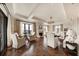 Elegant living room featuring hardwood floors, high ceilings, and ample natural light at 88 W Paces Ferry Nw Rd # 1740, Atlanta, GA 30305