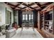 The executive office features custom ceiling, built-in shelving, and natural light at 88 W Paces Ferry Nw Rd # 1740, Atlanta, GA 30305