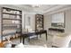 This executive office features custom shelving, designer accents, and natural light at 88 W Paces Ferry Nw Rd # 1740, Atlanta, GA 30305