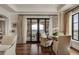 Sitting area with hardwood floors, access to a balcony, and comfortable seating and lots of light at 88 W Paces Ferry Nw Rd # 1740, Atlanta, GA 30305