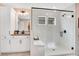Modern bathroom with a glass-enclosed shower, white cabinets, and contemporary fixtures at 151 Sunshower Rdg, Canton, GA 30114