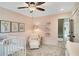 Bright Bedroom features a comfortable chair, crib, and decorative animal artwork at 151 Sunshower Rdg, Canton, GA 30114