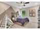 Stylishly designed bedroom with a unique teepee and patterned accent wall at 151 Sunshower Rdg, Canton, GA 30114