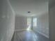 Light-filled bedroom with two windows, showcasing a peaceful and inviting atmosphere at 151 Sunshower Rdg, Canton, GA 30114