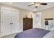 Cozy bedroom featuring a dark wood dresser and double door closet at 151 Sunshower Rdg, Canton, GA 30114
