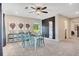 Inviting bonus room with stylish decor, including modern furniture, wall art, and backyard views at 151 Sunshower Rdg, Canton, GA 30114