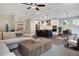 Bright and open living space with a modern kitchen island, stainless appliances, and plenty of room to entertain at 151 Sunshower Rdg, Canton, GA 30114