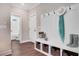 Hallway mudroom featuring built in bench and storage at 151 Sunshower Rdg, Canton, GA 30114