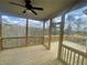 Inviting screened porch with beautiful views and a ceiling fan at 151 Sunshower Rdg, Canton, GA 30114