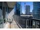 Condo balcony with city view and outdoor seating at 1080 Peachtree Ne St # 1408, Atlanta, GA 30309