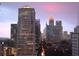 Beautiful evening cityscape view featuring skyscrapers and city lights at 1080 Peachtree Ne St # 1408, Atlanta, GA 30309