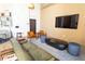 Modern living room with sleek furniture, a large flat-screen TV, and stylish decor for comfortable entertaining at 1080 Peachtree Ne St # 1408, Atlanta, GA 30309