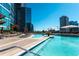 Upscale swimming pool area on a rooftop with city views and ample space for sunbathing at 1080 Peachtree Ne St # 1408, Atlanta, GA 30309