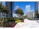 Outdoor rooftop terrace featuring lush landscaping, city views, and a peaceful relaxation area at 1080 Peachtree Ne St # 1408, Atlanta, GA 30309