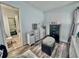 Well-lit bedroom with a cozy atmosphere and access to a bathroom at 4359 Idlewood Ln, Tucker, GA 30084