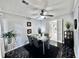 Charming dining room with glass table and ceiling fan at 4359 Idlewood Ln, Tucker, GA 30084