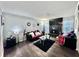 Stylish living room with modern fireplace, sleek furnishings, and hardwood floors at 4359 Idlewood Ln, Tucker, GA 30084