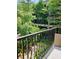 Private balcony overlooking a lush courtyard at 1850 Cotillion Dr # 3221, Dunwoody, GA 30338