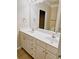Double vanity bathroom with beige tile floors at 1850 Cotillion Dr # 3221, Dunwoody, GA 30338