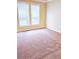 Bright bedroom with neutral walls and carpet at 1850 Cotillion Dr # 3221, Dunwoody, GA 30338