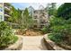 Charming courtyard with walking paths and lush gardens at 1850 Cotillion Dr # 3221, Dunwoody, GA 30338