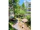 Tranquil courtyard with landscaping and a pond at 1850 Cotillion Dr # 3221, Dunwoody, GA 30338